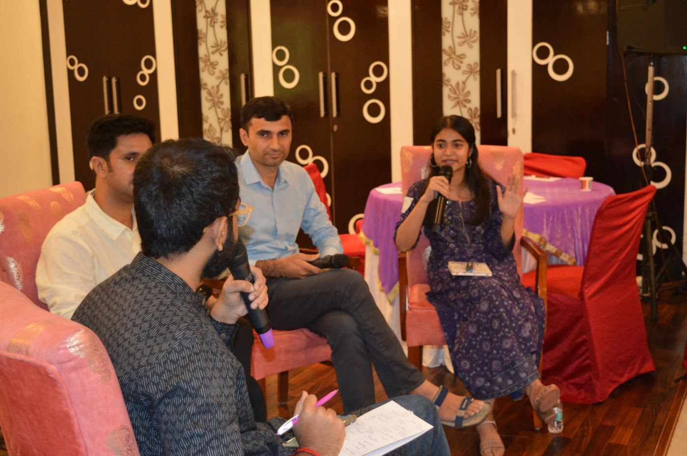 A small-group discussion at Social Impact Circle