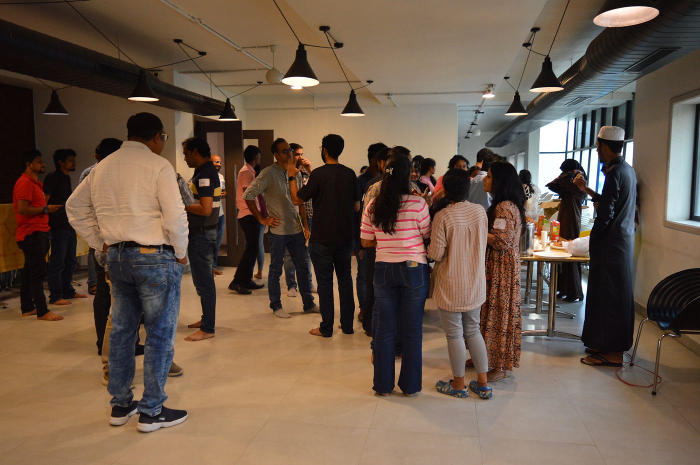 Attendees networking at Social Impact Circle